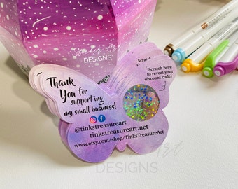 May include: A purple and pink butterfly-shaped thank you card with a scratch-off area to reveal a discount code. The card says "Thank You for supporting my small business!" and includes social media handles and a website address.