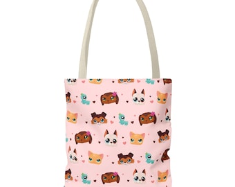 May include: A pink tote bag with a repeating pattern of cartoon cats and dogs with hearts and flowers. The bag has cream-colored handles.