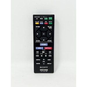 May include: Black Sony BD remote control with various buttons for TV and media player functions. Includes buttons for Netflix, Home, Play, Pause, and volume control. The model number RMT-B126A is visible.