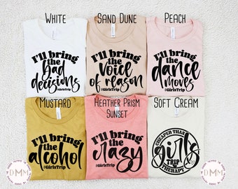 May include: Six different colored t-shirts with a variety of text designs. The text on the shirts reads "I'll bring the bad decisions", "I'll bring the voice of reason", "I'll bring the dance moves", "I'll bring the alcohol", "I'll bring the crazy", and "Cheaper than girls trip therapy".