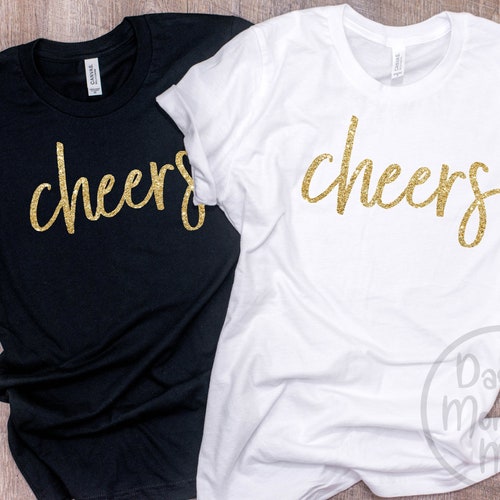 white shirt with gold glitter