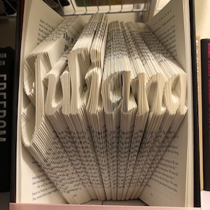 7 letter name book art