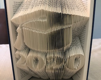 Graduation folded book art
