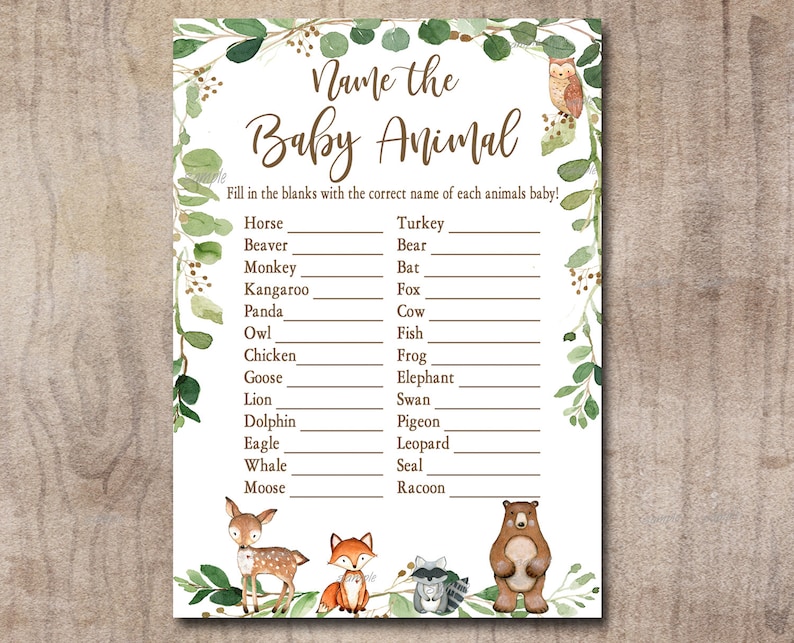 May include: A printable baby animal game with a green leafy border. The game asks players to fill in the blanks with the correct name of each animal's baby. The game features illustrations of a deer, fox, raccoon, and bear.
