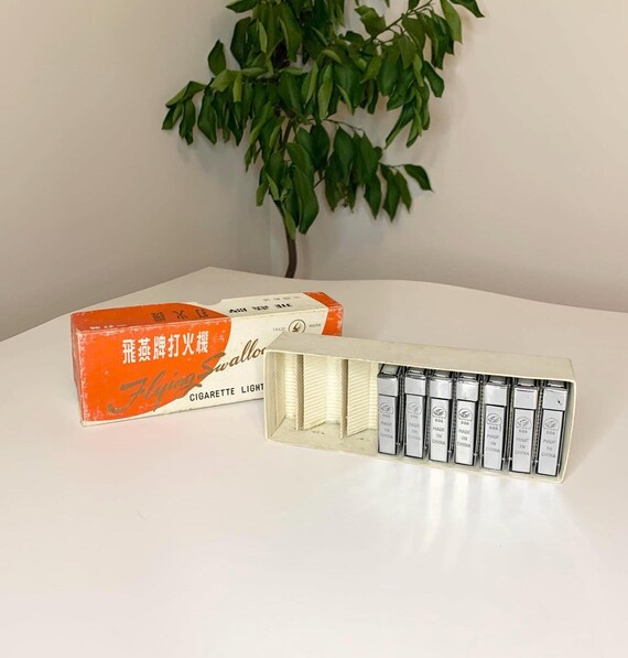 7 x New Old Stock Flying Swallow Cigarette Lighters in Original Box