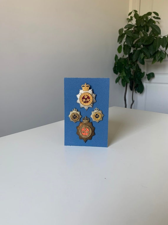 Canadian Guard Cap Badges and Collar "Dogs" Badges