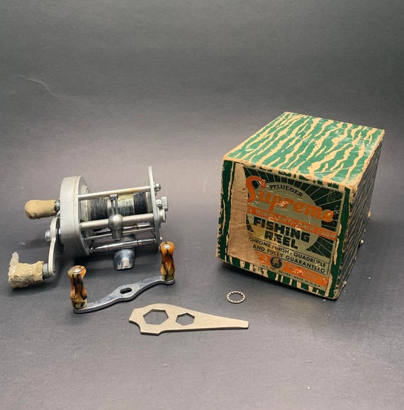 New Old Stock Pflueger Supreme No. 1573 "Satin Chrome Finish" Fishing Reel in Box with Extras