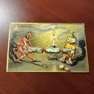 Ancienne carte postale d'Halloween en relief Jack O'Lantern & Devil Tug of War, série de cartes postales Tuck en relief n° 150