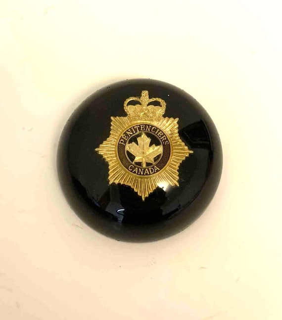 Acrylic Paperweight Featuring Badge from The Prison for Women, Kingston, Ontario
