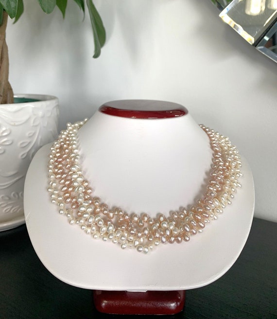 Four Strand Seed Pearls with 14k Yellow Gold Clasp