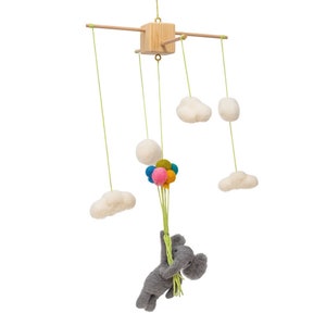Mobile with elephant, balloons and clouds made of felt