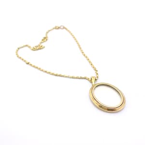 Antique Rolled Gold photo locket, plus gold-tone chain