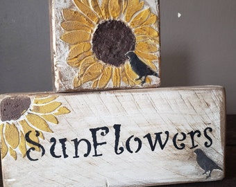 Estantería de madera de girasol primitiva con cuervo