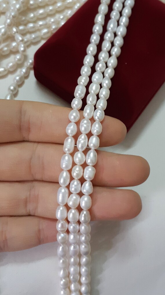 4-5mm Round Freshwater Pearls, White (16 Strand)