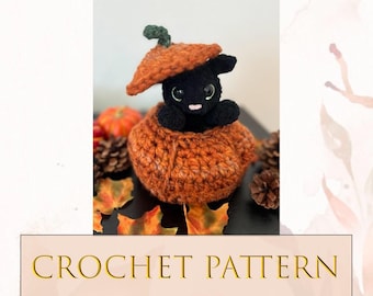 May include: Crochet pattern for a black cat in a pumpkin costume. The cat is peeking out of the top of the pumpkin, which is orange and brown. The pattern is called "Trixy the Pumpkin Kitty".