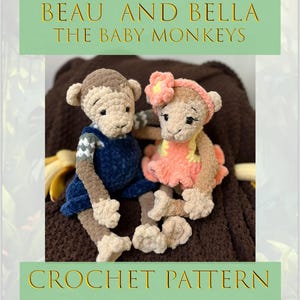 May include: Two crocheted monkey dolls, one in a blue dress and the other in a pink dress with a flower headband, sit on a brown surface. The text "BEAU AND BELLA THE BABY MONKEYS" and "CROCHET PATTERN" are displayed in gold lettering on a green background.