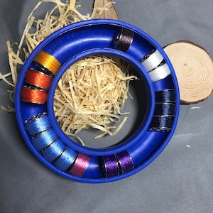 Silicone bobbin holder