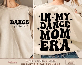May include: A beige sweatshirt with black text that reads "DANCE +Mom+" on the front and "IN MY DANCE MOM ERA" on the back. The text is in a retro, bubble-like font.