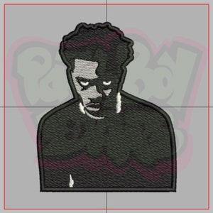 May include: Black and white embroidered patch of a person with a serious expression. The person has short, dark hair and is wearing a dark shirt.
