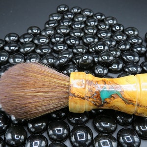 Handcrafted wood shaving brush from Cedar of Lebanon, green resin vein with faux horse bristle knot.