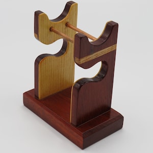 Handcrafted Paduak and Ash wood shaving stand for brush and razor with Copper rods. For traditional wet shavers.