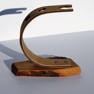 Handcrafted laminated pippy oak wood curved shaving stand for traditional wet shave razor and brush.