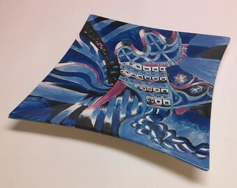 Hand painted ceramic plate in blues, black and purple