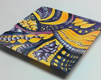 Hand painted plate - in blues, yellows and oranges