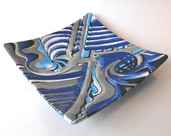 Small hand painted plate in blues and grays