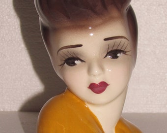 vintage doll head vases