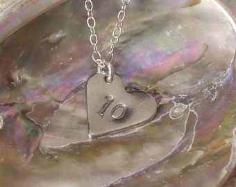 Tin Heart 10th Anniversary Necklace. Presented on Quality Sterling Silver Chain.