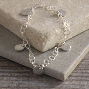 10 Year Anniversary Tin Disc Charms on Sterling Silver Bracelet. 10th Anniversary Jewellery. Tin Jewellery Gift. Tenth Wedding Anniversary.