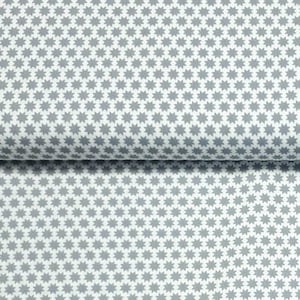 Könnte beinhalten: Eine Stoffrolle mit einem sich wiederholenden Muster aus grauen Sternen auf weißem Hintergrund. Der Stoff ist gefaltet und zeigt das Muster im Detail. Die Sterne sind gleichmäßig verteilt und erzeugen ein konsistentes Design.