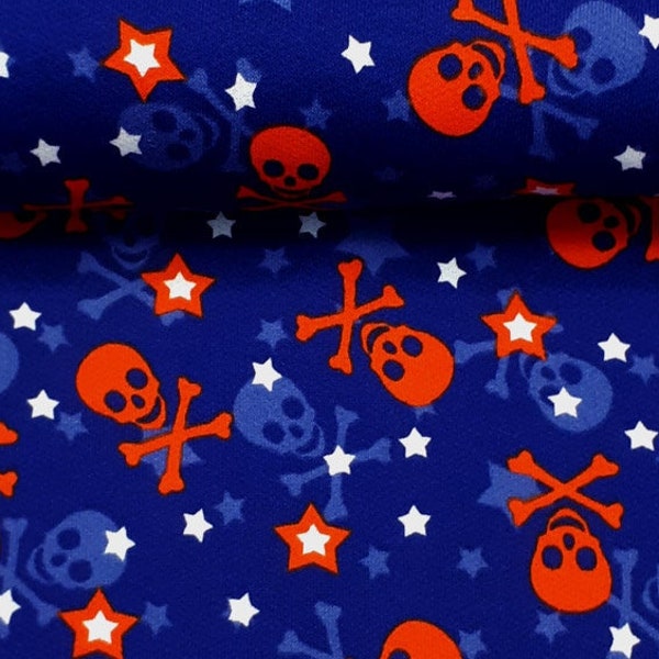 Tissu sweat crânes de pirate étoiles bleu fluo orange 0,5 m 100% coton