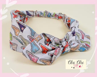 Satin headband with side bow. Elastic headband.