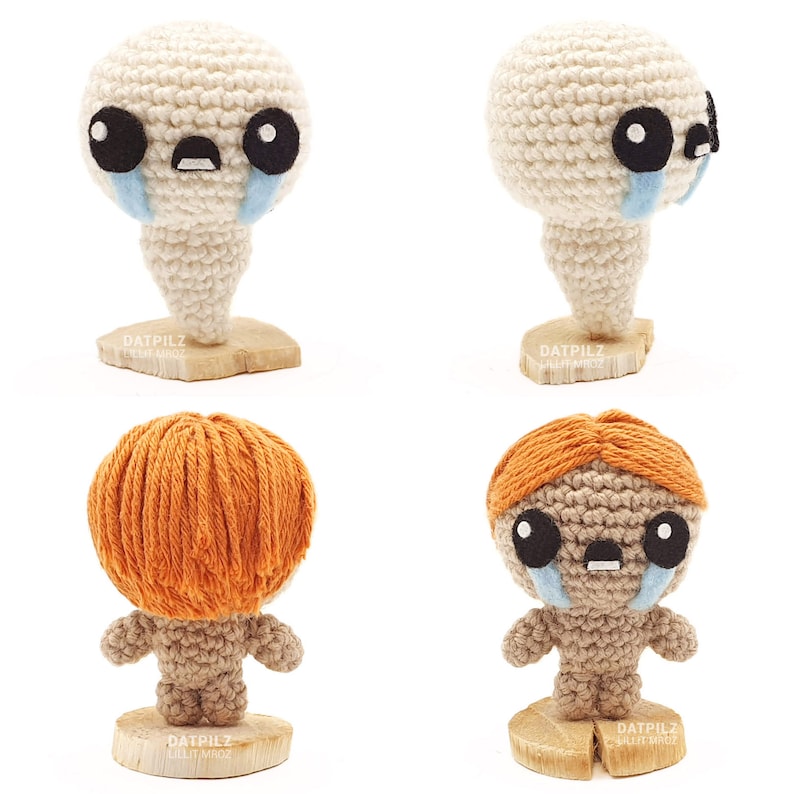 May include: Four crocheted plushies, two with orange hair and two with white bodies and blue teardrop eyes. Each plushie is standing on a wooden base with the text 'DATPILZ' printed on it.