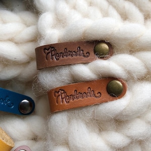 Custom leather tags for clothing, personalized tags on rivets, folded labels for knitting and crochet, handmade clothing labels, tags 8x1 cm