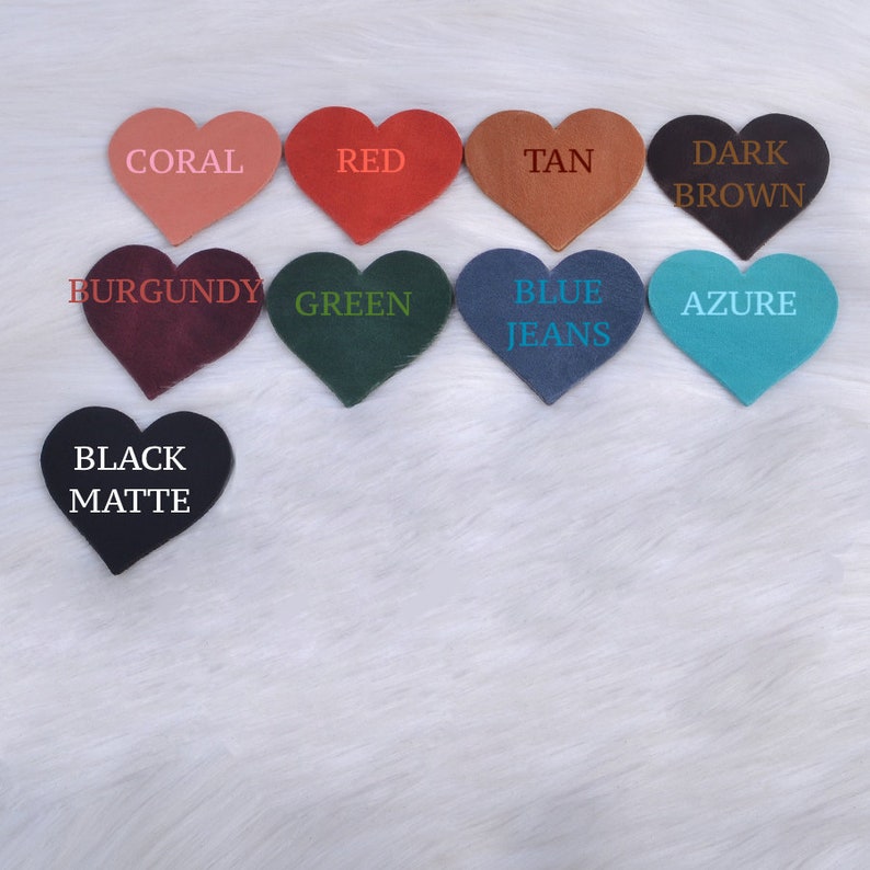 May include: Nine heart-shaped leather swatches in various colors, including coral, red, tan, dark brown, burgundy, green, blue jeans, azure, and black matte.