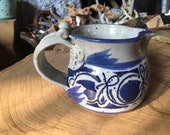 Small pottery pitcher with nice thumb dent detail