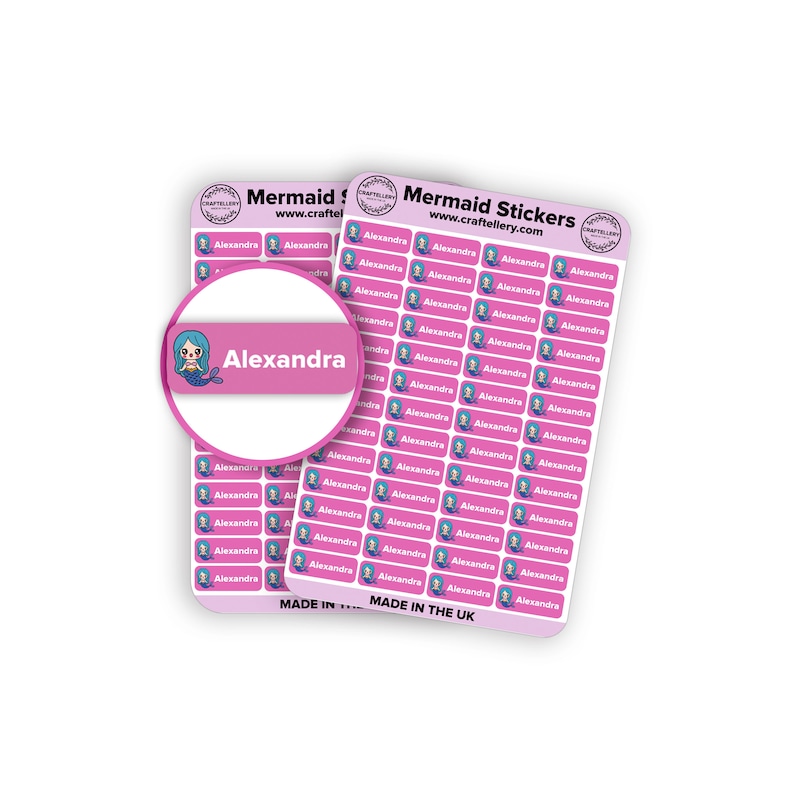 May include: Two sheets of pink mermaid stickers with the name "Alexandra" printed on them. Each sticker features a mermaid illustration and the text "Alexandra". The stickers are labeled "Mermaid Stickers" and "Made in the UK".