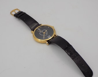 Montre vintage,Montre femme,montre élégante,bracelet noir,estampillé Pierre Ricci,montre de poignet,montre quartz