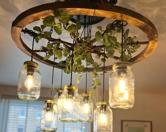Round pendant farmhouse vintage cartwheel light fitting chandelier with glass jar shades & plants. kitchen, living room bar and restaurant