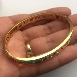 Cartier roman numeral hot sale bracelet