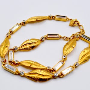 NINA RICCI Vintage 80s Gold tone Leafs with White Diamonds glass crystals  Designer Runway Couture Necklace Choker . Rare.  Gorgeous .