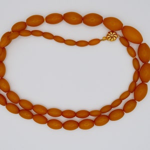 Galalith early plastic Graduated Honey Beads Necklace with Silver closure . Gorgeous .Rare. Collectible.
