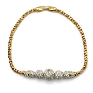 Swarovski Austenitic Vintage Singed  Beautiful Choker Necklace in Gold plated metal with Swarovski crystals . Rare. Vintage . Gorgeous .