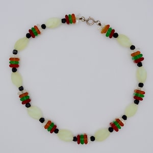 Art Deco Czech Uranium vaseline pistachio green Glass and multicoloured beads Necklace with Sterling closer . Beautiful. Rare. Collectible.