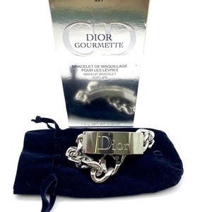 Dior Gourmette NEW Authentic Makeup Bracelet Lip Gloss 001 Made in France . Rare. Collectible. Stylish. Designer. In original packaging.
