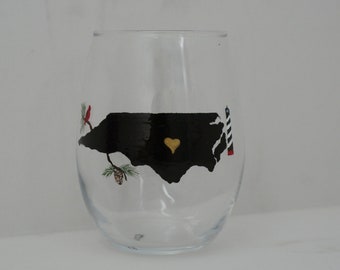 NC Silhouette Stemless Wine Glass; Hand painted; Lighthouse; Cardinal; Outline North Carolina with heart