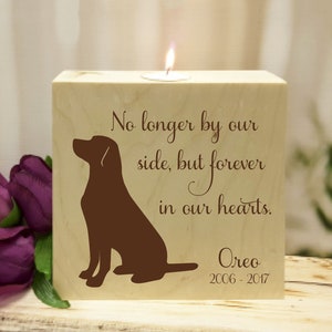 May include: Wooden candle holder with a silhouette of a dog and the text "No longer by our side, but forever in our hearts. Oreo 2006-2017".